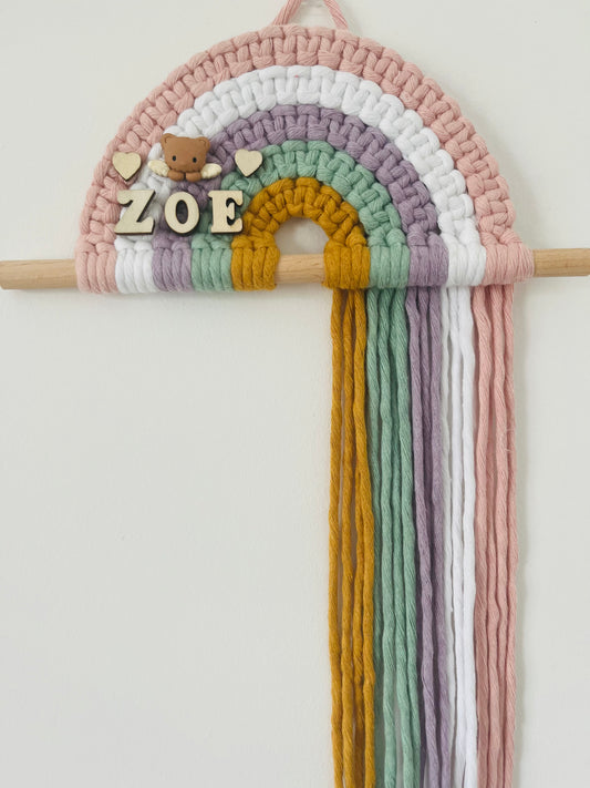 Personalised colourful macramé rainbow on a wooden dowel
